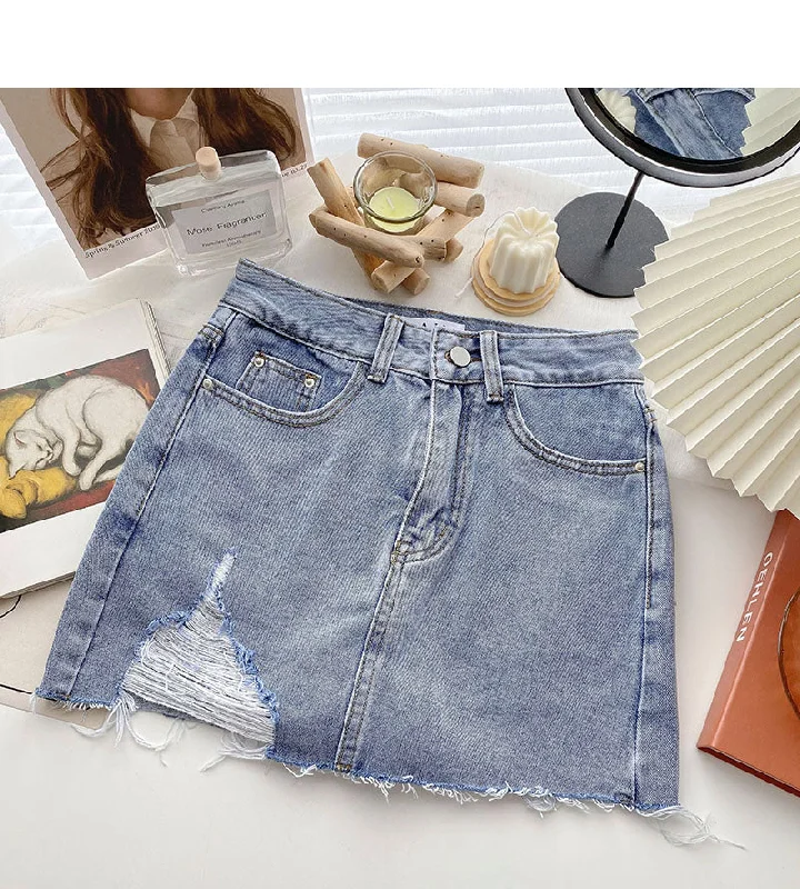 Korean version light proof personalized hole breaking high waist A-shaped skirt  5567 leather skirt bold