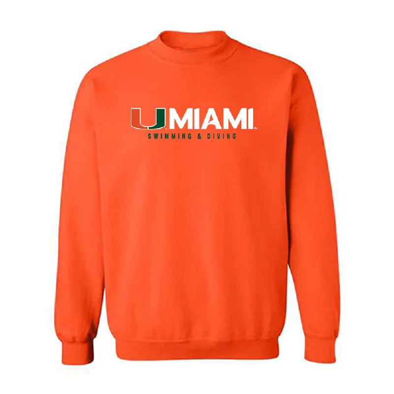 Miami - NCAA Women's Swimming & Diving : Simone Moll - Classic Shersey Crewneck Sweatshirt Hoodie with Side Slits Relaxed Casual