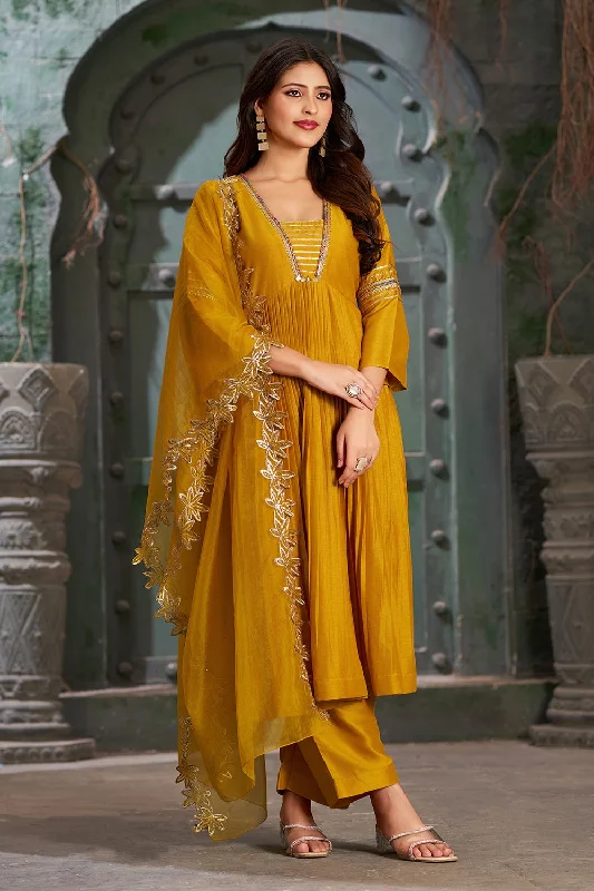 Women's Mustard Art Silk Alia Cut Anarkali Kurta Set With Trouser And Dupatta - Curvy Lane Trousers Leisure Comfortable Women's Mustard Art Silk Alia Cut Anarkali Kurta Set With Trouser And Dupatta - Curvy Lane Trousers Leisure Comfortable